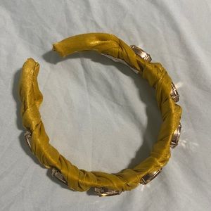 Gold headband with large embellishments